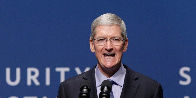 Apple CEO Tim Cook speaks at the White House Summit on Cybersecurity and Consumer Protection in Stanford, Calif., Friday, Feb. 13, 2015. (AP Photo/Jeff Chiu)