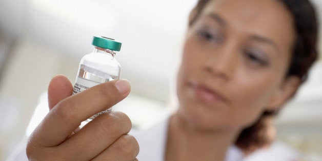 Woman with Medicine Vial