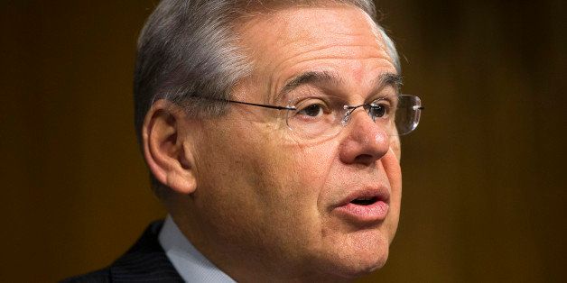 Sen. Robert Menendez, D-N.J., ranking member on the Senate Foreign Relation Committee, gives opening remarks on Capitol Hill in Washington, Wednesday, March 11, 2015, during the committee's hearing. America's top national security officials face questions on Capitol Hill about new war powers being drafted to fight Islamic State militants, Iran's sphere of influence and hotspots across the Mideast. (AP Photo/Pablo Martinez Monsivais)