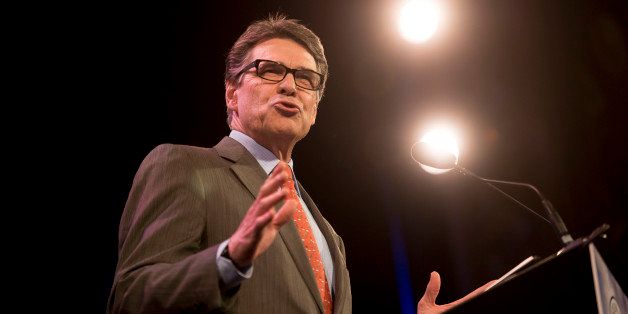 Rick Perry, former governor of Texas, speaks during the Iowa Freedom Summit in Des Moines, Iowa, U.S., on Saturday, Jan. 24, 2015. The talent show that is a presidential campaign began in earnest Saturday as more than 1,200 Republican activists, who probably will vote in Iowa's caucuses, packed into a historic Des Moines theater to see and hear from a parade of their party's prospective entries. Photographer: Daniel Acker/Bloomberg via Getty Images 