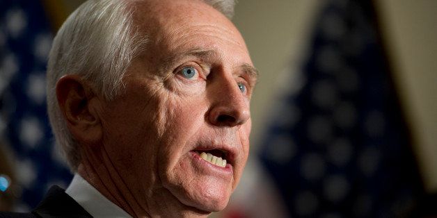 UNITED STATES - Dec 5: Gov. Steve Beshear, D-Ky. talks with reporters during a media availability on the Affordable Care Act immediately after a closed joint whip and caucus meeting in the U.S. Capitol on December 5, 2013. (Photo By Douglas Graham/CQ Roll Call)