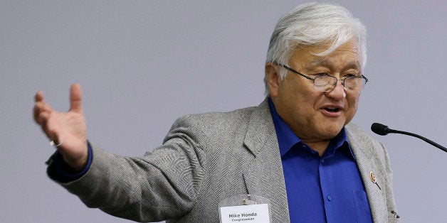 FILE- In this May 2, 2013 file photo, U.S. Rep. Mike Honda speaks during the City of Fremont Legislative Brunch at Tesla motors in Fremont, Calif. Honda and Tom McClintock have never apologized for their strong partisan leanings and are not about to start now. Honda, one of Congress' most liberal lawmakers, and McClintock, one of its most conservative, face challengers from within their own party in next Tuesday's midterm elections. (AP Photo/Jeff Chiu, file)