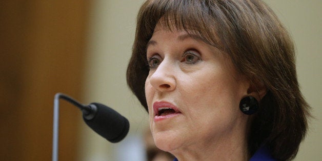 WASHINGTON, DC - MARCH 05: Former Internal Revenue Service official Lois Lerner exercises her Fifth Amendment right not to speak about the IRS targeting investigation before the House Oversight and Government Reform Committee during a hearing in the Rayburn House Office Building March 5, 2014 in Washington, DC. Chairman Darrell Issa (R-CA) adjuourned after Lerner refused to answer questions about the investigation. (Photo by Chip Somodevilla/Getty Images)