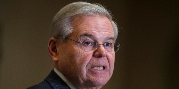 Sen. Bob Menendez, D-N.J., speaks to reporters during a news conference in Newark, N.J. on Friday, March 6, 2015. A person familiar with a federal investigation says the Justice Department is expected to bring criminal charges against the New Jersey Democrat in the coming weeks. Menendez says that he has always behaved appropriately in office. (AP Photo/John Minchillo)