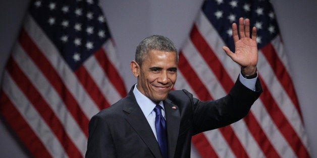 NATIONAL HARBOR, MD - MARCH 23: U.S. President Barack Obama waves after he spoke during the SelectUSA Investment Summit Marc