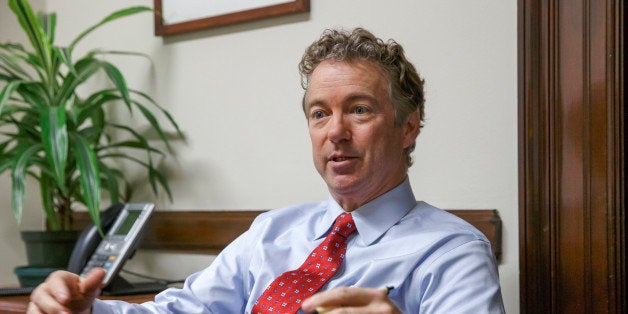 In this photo taken Feb. 10, 2015, Sen. Rand Paul, R-Ky. speaks in his office on Capitol Hill in Washington. In 2002, then Se