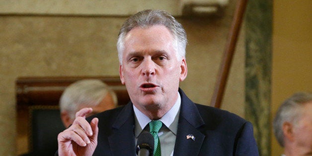 Virginia Gov. Terry McAuliffe gives his annual State of the Commonwealth address before a joint session of the Virginia House of Delegates and Virginia Senate at the Capitol in Richmond, Va., Wednesday, Jan. 14, 2015. (AP Photo/Steve Helber)