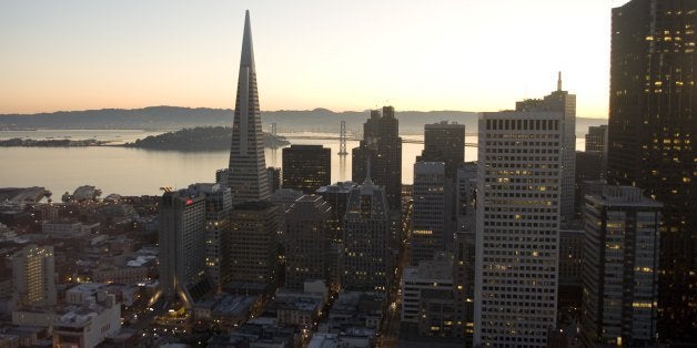 SAN FRANCISCO, CA - 2009: The sun rises on the Transamerica Pyramid and other downtown high-rise buildings in this 2009 San Francisco, California, early morning cityscape photo taken from Nob Hill. (Photo by George Rose/Getty Images)