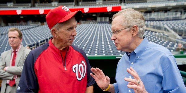 UNITED STATES - MAY 4: Senate Majority Leader Harry Reid, D-Nev., speaks with Washington Nationals manager Davey Johnson at Nationals Park in Washington before the game against Philadelphia on Friday, May 4, 2012. Sen. Reid visited the park to meet with outfielder Bryce Harper, a native of Nevada.(Photo By Bill Clark/CQ Roll Call)