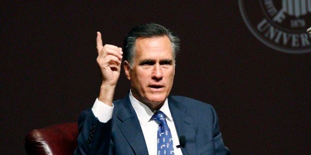 Former GOP presidential candidate Mitt Romney answers questions during a question-and-answer period following his address to the student body and guests in Starkville, Miss., Wednesday, Jan. 28, 2015. Romney joked about his time as a candidate and addressed a number of world issues including terrorism, world economy and domestically "the need for strong American leadership," and job creation for Americans. (AP Photo/Rogelio V. Solis)