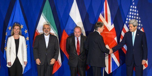 (From L) EU's foreign policy chief Federica Mogherini, Iranian Foreign Minister Mohammad Javad Zarif, Deputy director of the Department for Nonproliferation and Arms Control of the Ministry of Foreign Affairs of Russia Alexey Karpov, British Foreign Secretary Philip Hammond and US Secretary of State John Kerry attend the announcement of an agreement on Iran nuclear talks on April 2, 2015 at the The Swiss Federal Institutes of Technology (EPFL) in Lausanne. Iran and world powers said they had reached agreement on Thursday on 'key parameters' of a potentially historic deal aimed at preventing Tehran from building the bomb. AFP PHOTO / FABRICE COFFRINI (Photo credit should read FABRICE COFFRINI/AFP/Getty Images)