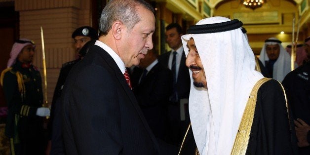 RIYADH, SAUDI ARABIA - MARCH 02: Turkish President Recep Tayyip Erdogan (L) is bid farewell by King of Saudi Arabia, Salman bin Abdulaziz Al Saud (R) after their meeting at Riyadh's Erga Palace in Saudi Arabia on March 02, 2015. (Photo by Kayhan Ãzer/Anadolu Agency/Getty Images)