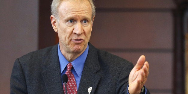 FILE - In this March 20, 2015, file photo, Illinois Gov. Bruce Rauner speaks at a news conference in Chicago. A bipartisan agreement to plug a $1.6 billion budget hole including more than $1.3 billion in fund transfers from a variety of sources to avert shutdowns of Illinois state programs and services was signed into law by Gov. Rauner on Thursday, March 26, 2015. (AP Photo/Charles Rex Arbogast, File)