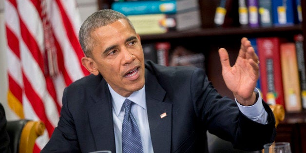 WASHINGTON, DC - APRIL 07: U.S. President Barack Obama speaks while participating in a roundtable discussion on the impacts of climate change on public health at Howard University in Washington, D.C., U.S., on Tuesday, April 7, 2015. President Obama is warning that climate change will start affecting AmericansÃ health in the near future and heÃs recruiting top technology companies to help prepare the nationÃs health systems. (PHoto by Andrew Harrer-Pool/Getty Images)