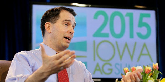 FILE - In this March 7, 2015 file photo, Wisconsin Gov. Scott Walker speaks during the Iowa Agriculture Summit in Des Moines, Iowa. Known for his accessibility and willingness to always be available to take questions, even after the most routine appearances, Walker has suddenly become much harder to reach as he ramps up for a likely 2016 presidential campaign and deals with a series of flubs and shifts in position on hot button issues. (AP Photo/Charlie Neibergall)