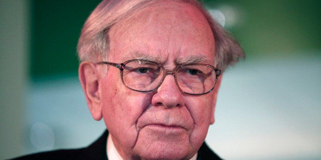 DETROIT, MI - NOVEMBER 25: Warren Buffett, Chairman and CEO of Berkshire Hathaway and Co-Chairman of Goldman Sachs 10,000 Small Businesses Program, attends a press conference where it was announced that Detroit was named the 11th city to be included in the $500 million Goldman Sachs initiative November 26, 2013 at Ford Field in Detroit, Michigan. Under the program, small businesses in Michigan will be eligible to receive $20 million in loans. The initiative was designed to help small business entrepreneurs create jobs and grow their businesses.(Photo by Bill Pugliano/Getty Images)