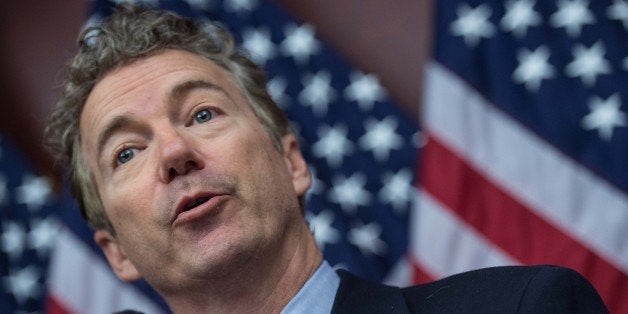 US Republican Senator from Kentucky Rand Paul speaks at a press conference to announce new bipartisan legislation to allow patients, doctors and businesses in states that have already passed medical marijuana laws to participate in those programs without fear of federal prosecution.on Capitol Hill in Washington, DC, on March 10, 2015. AFP PHOTO/NICHOLAS KAMM (Photo credit should read NICHOLAS KAMM/AFP/Getty Images)