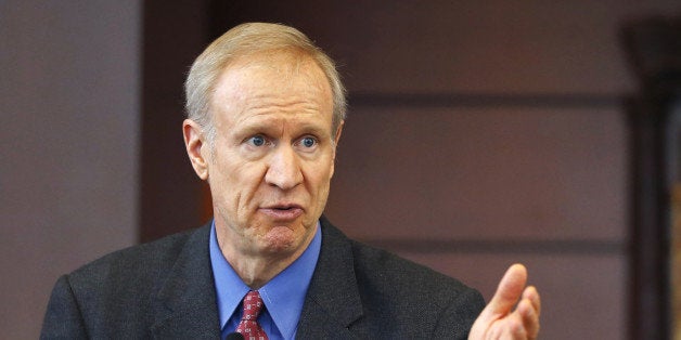 FILE - In this March 20, 2015, file photo, Illinois Gov. Bruce Rauner speaks at a news conference in Chicago. A bipartisan agreement to plug a $1.6 billion budget hole including more than $1.3 billion in fund transfers from a variety of sources to avert shutdowns of Illinois state programs and services was signed into law by Gov. Rauner on Thursday, March 26, 2015. (AP Photo/Charles Rex Arbogast, File)