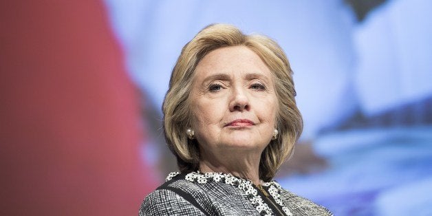 Former Secretary of State Hillary Clinton waits to speak at the World Bank May 14, 2014 in Washington, DC. Clinton and World
