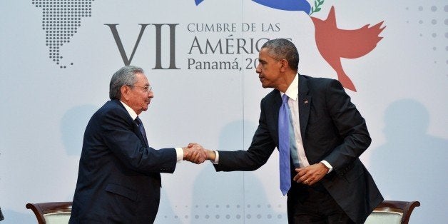 US President Barack Obama (R) shakes hands with Cuba's President Raul Castro (L) on the sidelines of the Summit of the Americas at the ATLAPA Convention Center on April 11, 2015 in Panama City. AFP PHOTO/MANDEL NGAN (Photo credit should read MANDEL NGAN/AFP/Getty Images)