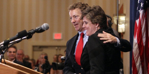 U.S. Sen. Rand Paul, R-Ky., hugs New Hampshire State GOP chairwoman Jennifer Horn as he is introduced at the New Hampshire Re
