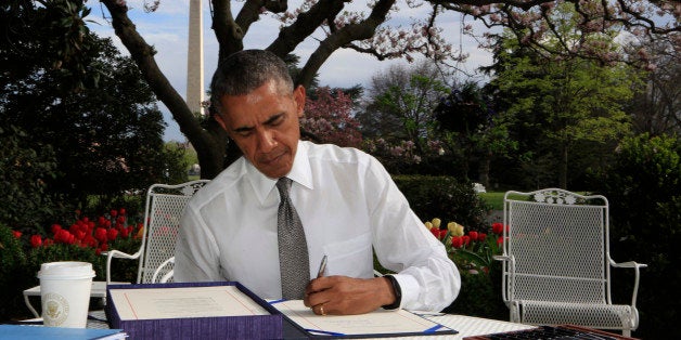 WASHINGTON, DC - APRIL 16: U.S. President Barack Obama signs the Medicare Access CHIP Reauthorization Act 2015 on April 16, 2015 in Washington, DC. H.R. 2, commonly known as 'Doc Fix', is a bipartisan bill to strengthen Medicare and fix its payment formula for doctors. CHIP refers to the Children's Health Insurance Program. (Photo by Dennis Brack-Pool/Getty Images)