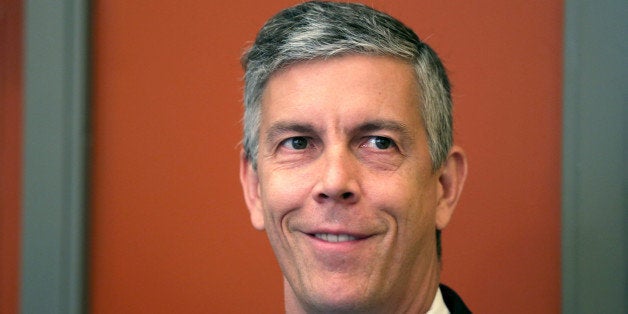 WASHINGTON, DC - AUGUST 27: U.S. Education Secretary Arne Duncan waits to be introduced prior to speaking to students at School Without Walls August 27, 2013 in Washington, DC. Duncan participated in an event to discuss '50 Years of Struggle: Youth Driving Economics, Education, and Social Change,' which was to mark the 50th anniversary of Dr. Martin Luther King Jr.'s 'I Have a Dream' speech. (Photo by Alex Wong/Getty Images)