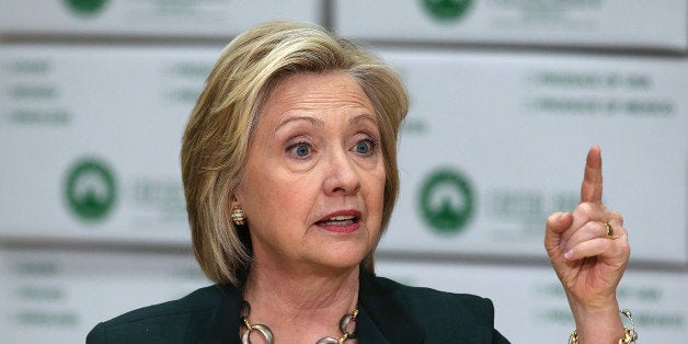 NORWALK, IA - APRIL 15: Democratic presidential hopeful and former Secretary of State Hillary Clinton speaks during a roundtable discussion with members of the small business community at Capital City Fruit on April 15, 2015 in Norwalk, Iowa. Hillary Clinton continues to campaign throughout Iowa as she makes her second bid for President of the United States. (Photo by Justin Sullivan/Getty Images)