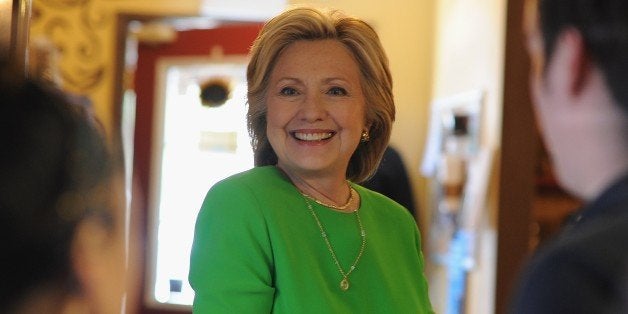 Hillary Clinton has coffee with local residents at the Jones Street Java House during a campaign visit April 14, 2015 in Le Claire, Iowa. Hillary Clinton announced her candidacy for the United States presidency on April 12, 2015 and is expected to be the frontrunner for the Democratic Party nomination. AFP PHOTO / MICHAEL B. THOMAS (Photo credit should read Michael B. Thomas/AFP/Getty Images)