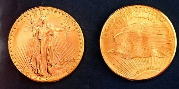 FILE--This is an undated photo of replicas similar to rare gold coins stolen from the Philadelphia Mint in 1933. Secret Service agents arrested two coin dealers as they were preparing to sell a rare gold coin for $1.5 million. The coin, an Augustus Saint-Gaudens double eagle $20 coin, is illegal to own because it never went into circulation. Stephen Charles Fenton, 43, of North Harrow, England, and Jasper Parrino, 49, of Lee's Summit, Mo., were arrested last week when they met with a prospective buyer who turned out to be a Secret Service agent, authorities said Monday, Feb. 13, 1996. (AP Photo)