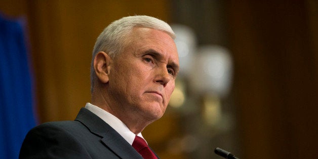INDIANAPOLIS, IN - MARCH 31: Indiana Gov. Mike Pence speaks during a press conference March 31, 2015 at the Indiana State Lib