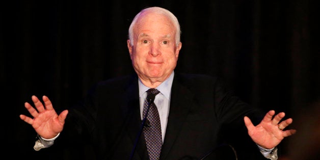 Sen. John McCain, R-Ariz. acknowledges the crowd for their standing ovation as McCain formally announces his candidacy for re