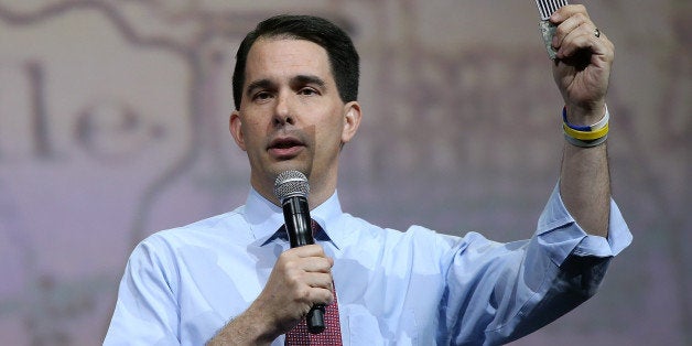 NASHVILLE, TN - APRIL 10: Wisconsin Gov. Scott Walker speaks during the NRA-ILA Leadership Forum at the 2015 NRA Annual Meeting & Exhibits on April 10, 2015 in Nashville, Tennessee. The annual NRA meeting and exhibit runs through Sunday. (Photo by Justin Sullivan/Getty Images)