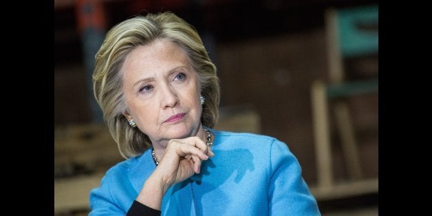 KEENE, NH - APRIL 20: Democratic presidential hopeful and former U.S. Sectetary of State Hillary Clinton speaks to employees of Whitney Brothers, an educational furniture manufacturer, at a round table discussionon April 20, 2015 in Keene, New Hampshire. This marks Clinton's first major political event in New Hampshire after announcing her campaign for president a little over a week ago. (Photo by Andrew Burton/Getty Images)