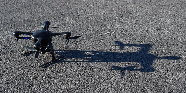 LAS VEGAS, NV - JANUARY 08: A Ghost drone by EHang is prepared for a flight at the 2015 International CES outside the Las Vegas Convention Center on January 8, 2015 in Las Vegas, Nevada. The Ghost can be piloted by a smartphone without a remote control and only needs one click to take off, return and land. CES, the world's largest annual consumer technology trade show, runs through January 9 and is expected to feature 3,600 exhibitors showing off their latest products and services to about 150,000 attendees. (Photo by Ethan Miller/Getty Images)