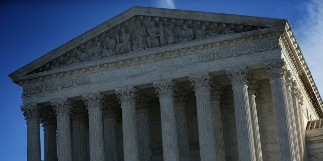 WASHINGTON, DC - JANUARY 09: An exterior view of the U.S. Supreme Court January 9, 2015 in Washington, DC. The justices of the Supreme Court were scheduled to meet to determine whether the court will take up any of the five pending state-banned same-sex marriage cases in Ohio, Tennessee, Michigan, Kentucky and Louisiana.> on January 9, 2015 in Washington, DC. (Photo by Alex Wong/Getty Images)