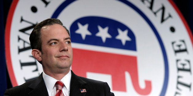 Republican National Committee (RNC) Chairman Reince Priebus stands on stage at the Republican National Committee winter meeting in Washington, Friday, Jan. 24, 2014. (AP Photo/Susan Walsh)