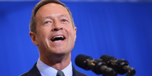 Maryland Governor Martin O'Malley introduces US President Barack Obama at Prince Georges Community College on September 26, 2