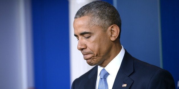 US President Barack Obama speaks during a press conference in the Brady Briefing Room of the White House on April 23, 2015 in Washington, DC. The White House admitted Thursday that a January US operation against an Al Qaeda compound near the Afghan-Pakistan border killed one American and one Italian hostage, along with an American member of the jihadist group. The White House identified the hostages killed in the operation against the border compound as US contractor Warren Weinstein and Italian aid worker Giovanni Lo Porto. AFP PHOTO/MANDEL NGAN (Photo credit should read MANDEL NGAN/AFP/Getty Images)