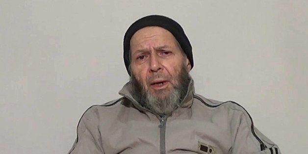This image made from video released anonymously to reporters in Pakistan, including the Associated Press on Thursday, Dec. 26, 2013, which is consistent with other AP reporting, shows Warren Weinstein, a 72-year-old American development worker who was kidnapped in Pakistan by al-Qaida more than two years ago, appealing to President Obama to negotiate his release. Family members of the American development expert kidnapped in Pakistan by al-Qaida more than two years ago say a recently released video and letter haven't convinced them he's alive. (AP Photo via AP video)