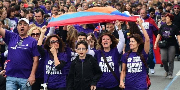 Tens of thousands of Armenian Americans take to the streets of Los Angeles on April 24, 2015, to march for justice and in memory of victims of the Armenian genocide. The event marks the centenary of the massacre of some 1.5 million Armenians by Ottoman forces. AFP PHOTO / FREDERIC J. BROWN (Photo credit should read FREDERIC J. BROWN/AFP/Getty Images)