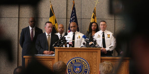 BALTIMORE, MD - APRIL 24: Baltimore City Police Commissioner Anthony Batts (C) speaks during a news conference at the police headquarters April 24, 2015 in Baltimore, Maryland. Batts spoke on the latest development of the death of Baltimore resident Freddie Gray one week after being under custody in a police van. Gray, 25, had been arrested for possessing a switch blade knife April 12th outside the Gilmor Homes housing project on Baltimore's west side. According to his attorney, Gray died in the hospital from a severe spinal cord injury. (Photo by Alex Wong/Getty Images)