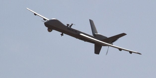 A Reaper drone of the aerial detachment of the Operation Barkhane flies over the Nigerian military airport Diori Hamani in Niamey on January 2, 2015. Operation Barkhane is an anti-Islamist operation in Africa's Sahel region beginning in July 2014 which consists of a 3,000-strong French force. AFP PHOTO / DOMINIQUE FAGET (Photo credit should read DOMINIQUE FAGET/AFP/Getty Images)