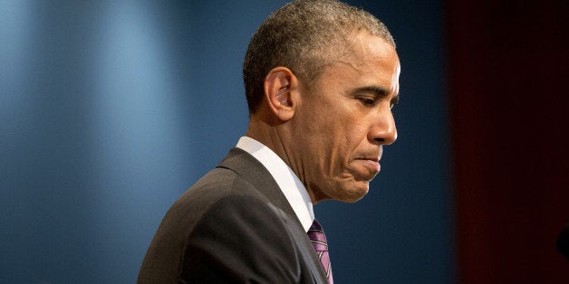 President Barack Obama pauses while speaking at the Office of the Director of National Intelligenceâs (ODNI) 10th anniversary at ODNI headquarters in McLean, Va., Friday, April 24, 2015. The president told members of the intelligence community that he appreciates their service and understands they don't take their work lightly. (AP Photo/Pablo Martinez Monsivais)