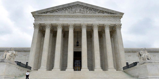 This photo taken Friday, Oct. 3, 2014, shows the U.S. Supreme Court in Washington. A Supreme Court term that is starting Monday, Oct. 6, 2014, with a lack of headline-grabbing cases may end with a blockbuster that helps define the legacy of the court under Chief Justice John Roberts. That's because the justices appear likely to take on the issue of same-sex marriage and decide once and for all whether gay and lesbian couples have a constitutional right to marry. (AP Photo/Susan Walsh)