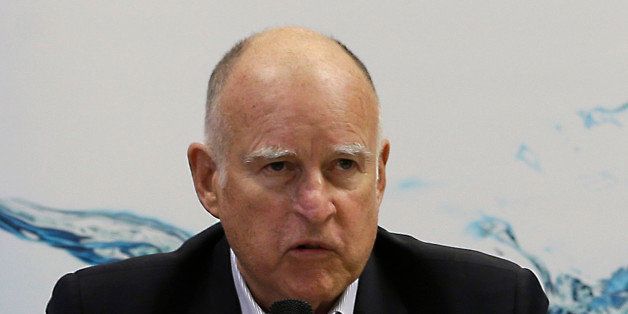 California Gov. Jerry Brown talks to reporters after a three-hour meeting on the drought with agricultural, environmental and urban water agency leaders from across California, Wednesday, April 8, 2015, at his Capitol office in Sacramento. (AP Photo/Rich Pedroncelli)