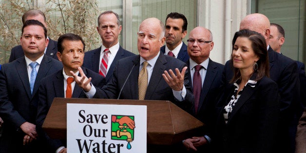 Gov. Jerry Brown talks during a news conference after meeting with several California mayors to discuss water conservation at the Capitol in Sacramento, Calif., on Tuesday, April 28, 2015. Gov. Brown called for $10.000 fines for residents and businesses that waste the most water as California cities try t o meet mandatory conservation targets during the drought. (AP Photo/Steve Yeater)