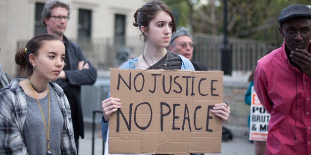 NEW YORK, NY - APRIL 28: Police brutality activists gather in Union Square in solidarity with the ongoing Baltimore protests over the death of Freddie Gray on April 28, 2015 in New York City. Gray, 25, was arrested for possessing a switch blade knife April 12 outside the Gilmor Houses housing project on Baltimore's west side. According to his attorney, Gray died a week later in the hospital from a severe spinal cord injury he received while in police custody. (Photo by Kevin Hagen/Getty Images)