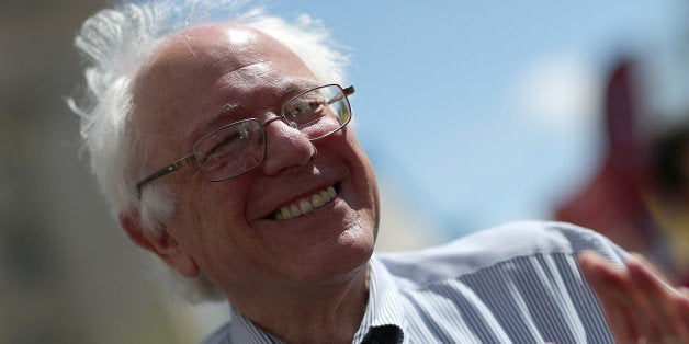 WASHINGTON, DC - APRIL 20: U.S. Sen. Bernie Sanders (I-VT) participates in a 'Don't Trade Our Future' march organized by the group Campaign for America's Future April 20, 2015 in Washington, DC. The event was part of the Populism 2015 Conference which is conducting their conference with the theme 'Building a Movement for People and the Planet.' (Photo by Win McNamee/Getty Images)