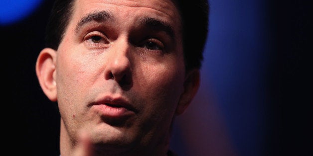 WAUKEE, IA - APRIL 25: Governor Scott Walker of Wisconsin speaks to guests gathered at the Point of Grace Church for the Iowa
